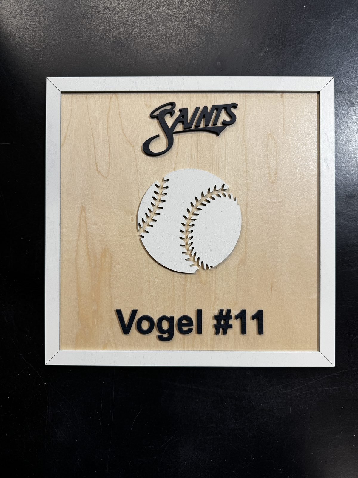 Finished personalized Saints baseball plaque made from layered wood