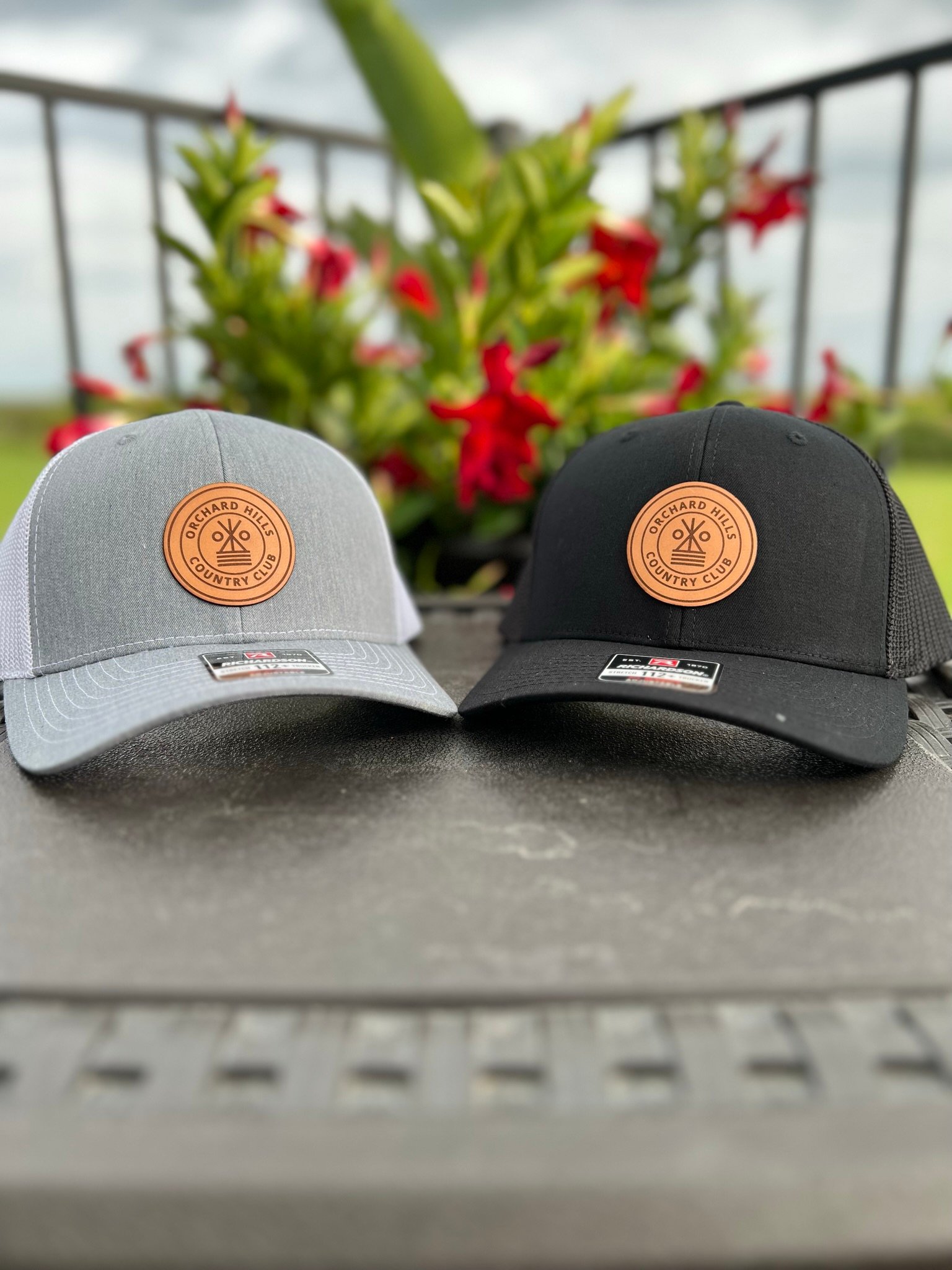 Two premium caps with custom engraved leather patches
